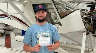 Student with diploma